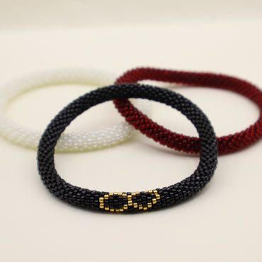 Set de Pulseras Infinito Negro, Crema y Rojo Vino