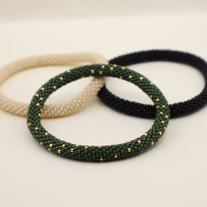 Selva Dorada | Set de 3 pulseras tejidas a mano